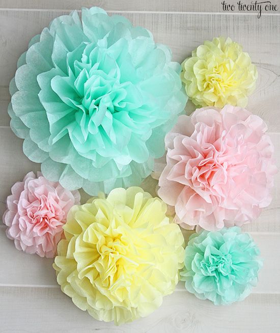 Tissue paper pom poms via twotwentyone.net.